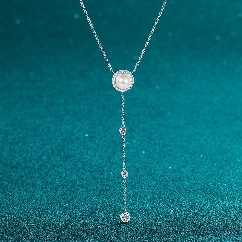 Silver Necklace with One Big Pearl and Three Small Charms